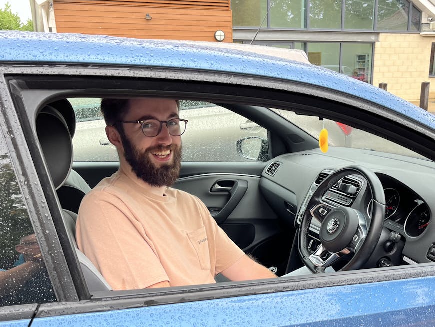 Mark in his car